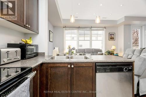 #604 -1011 Deta Rd, Mississauga, ON - Indoor Photo Showing Kitchen With Double Sink