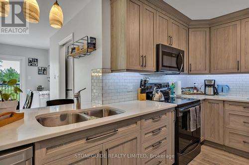 36 Almeara Dr, Otonabee-South Monaghan, ON - Indoor Photo Showing Kitchen With Double Sink