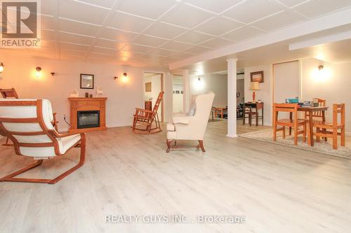 166 Adam And Eve Road, Galway-Cavendish And Harvey, ON - Indoor With Fireplace