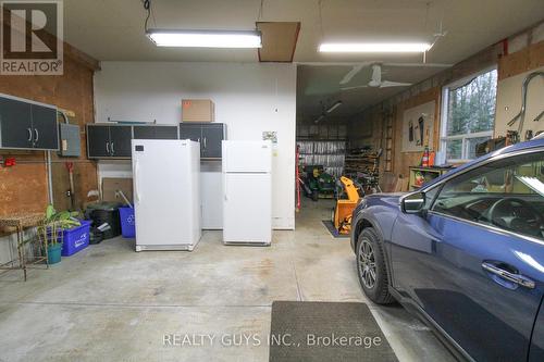 166 Adam And Eve Rd, Galway-Cavendish And Harvey, ON - Indoor Photo Showing Garage