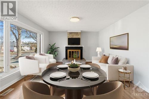 This Photo is Virtually Staged - 1508 Chatelain Avenue, Ottawa, ON - Indoor With Fireplace