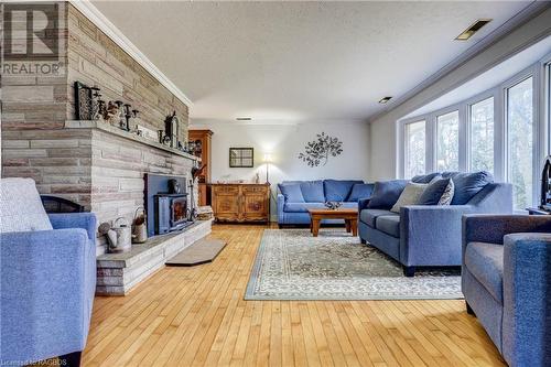 3 Rogers Road, Mansfield, ON - Indoor Photo Showing Living Room With Fireplace
