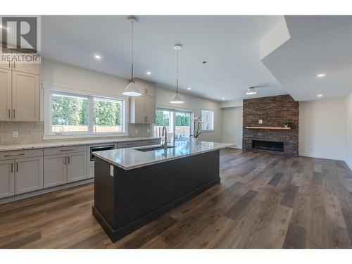 1719 Britton Road, Summerland, BC - Indoor Photo Showing Kitchen With Fireplace With Upgraded Kitchen
