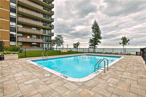 outdoor pool in the summertime! - 500 Green Road|Unit #1414, Stoney Creek, ON - Outdoor With In Ground Pool