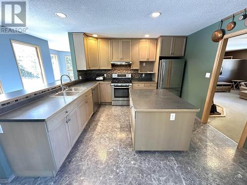 3338 Pigeon Road, 150 Mile House, BC - Indoor Photo Showing Kitchen With Double Sink