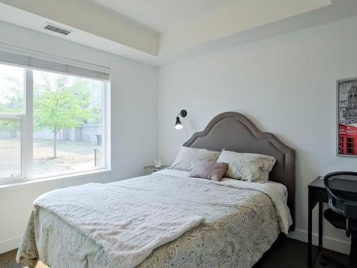 107-985 Academy Way, Kelowna, BC - Indoor Photo Showing Bedroom