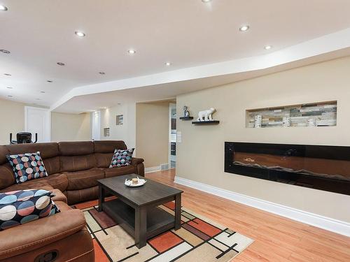Family room - 582 Boul. Goineau, Laval (Pont-Viau), QC - Indoor Photo Showing Living Room With Fireplace