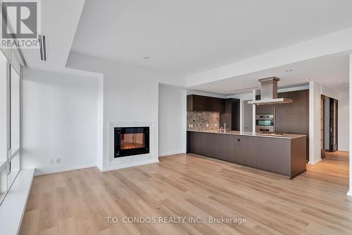 #3203 -180 University Ave, Toronto, ON - Indoor Photo Showing Other Room With Fireplace