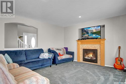 4859 Singer Court, Regina, SK - Indoor Photo Showing Living Room With Fireplace