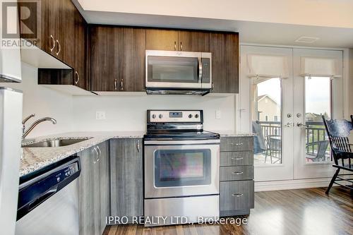 #308 -6 Anchorage Cres, Collingwood, ON - Indoor Photo Showing Kitchen With Stainless Steel Kitchen With Upgraded Kitchen