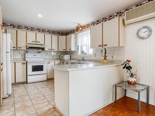 Kitchen - 670 Rue Ravel, Brossard, QC - Indoor Photo Showing Kitchen