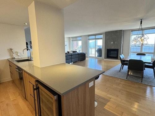 Kitchen - 514-2160 Av. Terry-Fox, Laval (Chomedey), QC - Indoor With Fireplace