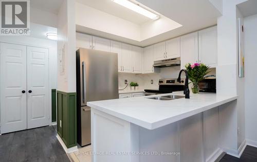 2054 - 3041 Finch Avenue W, Toronto, ON - Indoor Photo Showing Kitchen With Double Sink