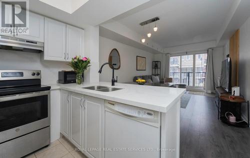 2054 - 3041 Finch Avenue W, Toronto, ON - Indoor Photo Showing Kitchen With Double Sink