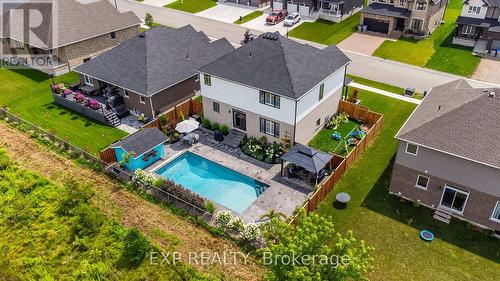 675 Conners Dr, North Perth, ON - Outdoor With In Ground Pool With Deck Patio Veranda With View