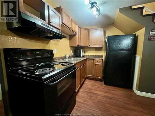 118-120 Vail St, Moncton, NB - Indoor Photo Showing Kitchen With Double Sink