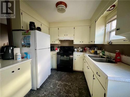 118-120 Vail St, Moncton, NB - Indoor Photo Showing Kitchen With Double Sink