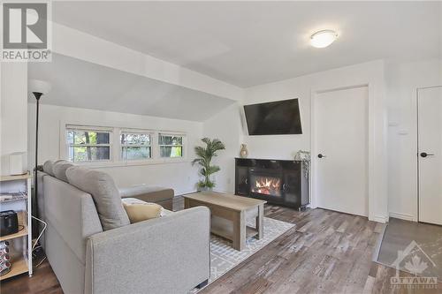 12 Panama Avenue, Nepean, ON - Indoor Photo Showing Living Room With Fireplace