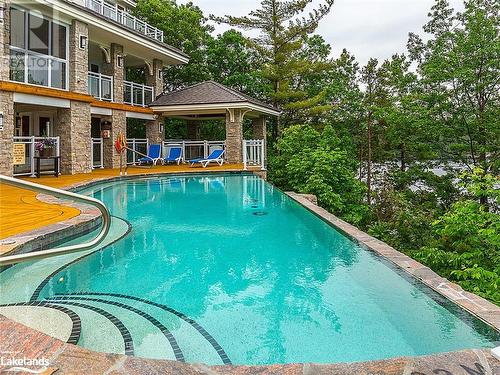 1869 Muskoka Road 118 Highway W Unit# A202-D1, Muskoka Lakes, ON - Outdoor With In Ground Pool With Backyard