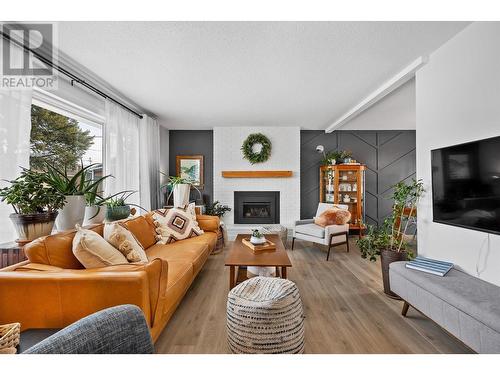 1377 Lambly Place, Kelowna, BC - Indoor Photo Showing Living Room With Fireplace
