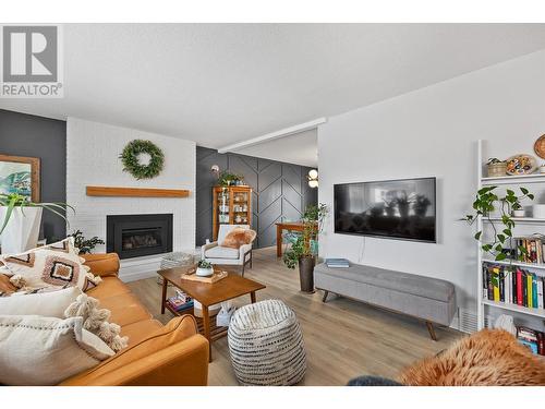 1377 Lambly Place, Kelowna, BC - Indoor Photo Showing Living Room With Fireplace