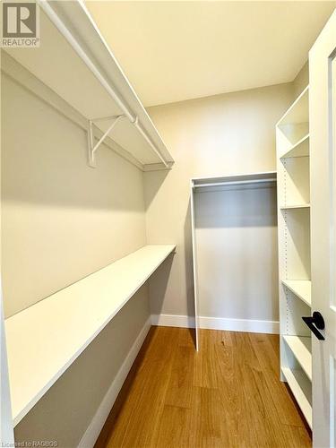 Walk in closet in the primary bedroom - 384 Rosner Drive, Port Elgin, ON - Indoor With Storage