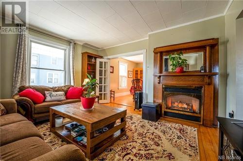 14 Rose Street, St. Stephen, NB - Indoor Photo Showing Living Room With Fireplace