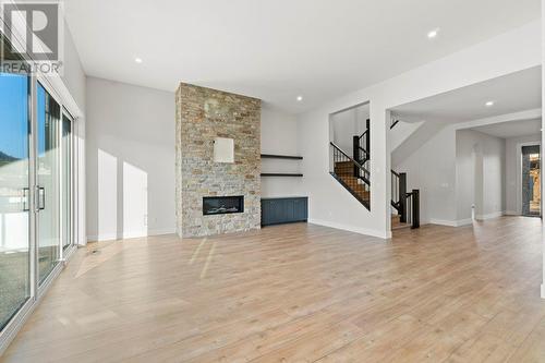 2700 Ridgemount Drive, West Kelowna, BC - Indoor Photo Showing Living Room With Fireplace