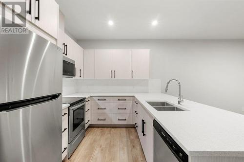 2700 Ridgemount Drive, West Kelowna, BC - Indoor Photo Showing Kitchen With Double Sink