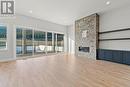 2700 Ridgemount Drive, West Kelowna, BC  - Indoor Photo Showing Living Room With Fireplace 