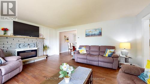 19 Locke Ave, Clearview, ON - Indoor Photo Showing Living Room With Fireplace