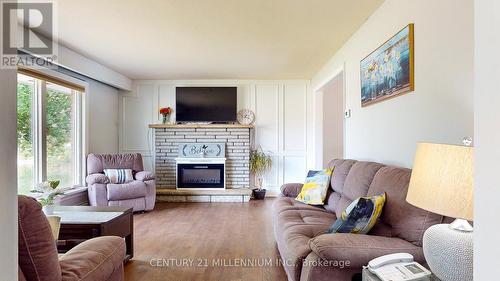 19 Locke Ave, Clearview, ON - Indoor Photo Showing Living Room With Fireplace