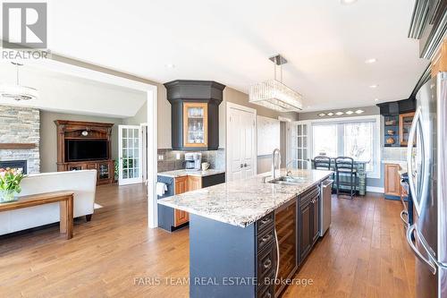 3991 2Nd Line, Innisfil, ON - Indoor Photo Showing Kitchen With Fireplace