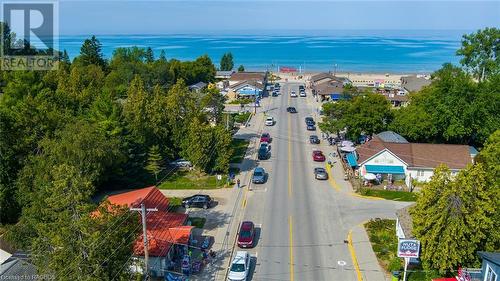 Distance from 310 Main to the Welcome to Sauble Beach sign is approximately 3 minute walk /240 m - 310 Main Street, Sauble Beach, ON - Outdoor With Body Of Water With View