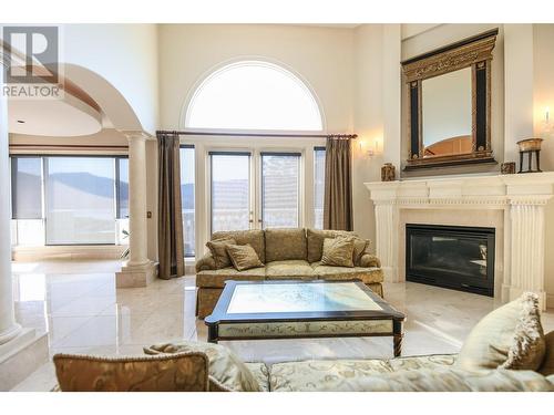 3715 30Th Avenue, Osoyoos, BC - Indoor Photo Showing Living Room With Fireplace