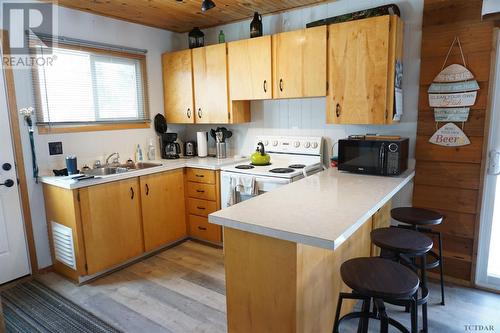 59 Ontario St, Elk Lake, ON - Indoor Photo Showing Kitchen With Double Sink