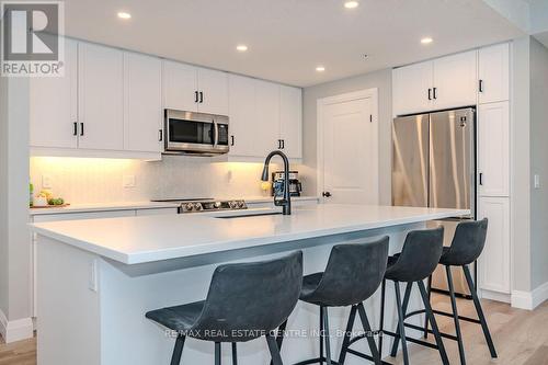 #301 -99A Farley Rd, Centre Wellington, ON - Indoor Photo Showing Kitchen With Upgraded Kitchen