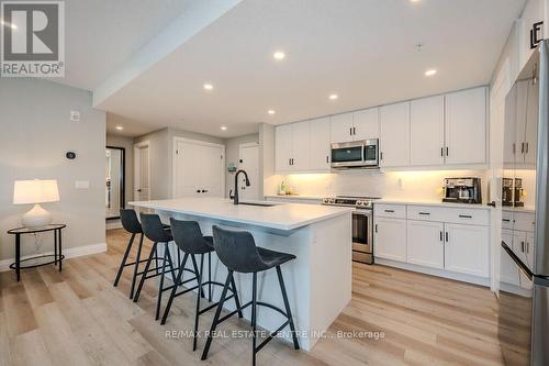 #301 -99A Farley Rd, Centre Wellington, ON - Indoor Photo Showing Kitchen With Upgraded Kitchen