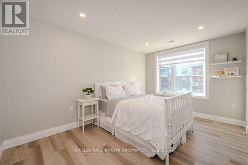 #301 -99A Farley Rd, Centre Wellington, ON - Indoor Photo Showing Bedroom