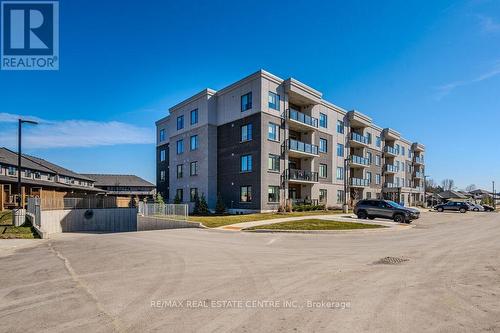 301 - 99A Farley Road, Centre Wellington, ON - Outdoor With Balcony With Facade