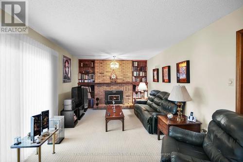 11 Glenview Cres, London, ON - Indoor Photo Showing Living Room With Fireplace