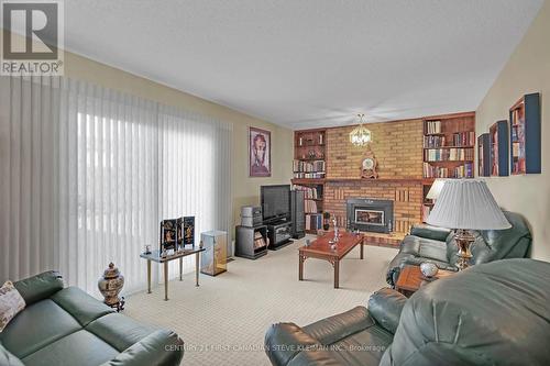 11 Glenview Cres, London, ON - Indoor Photo Showing Living Room With Fireplace