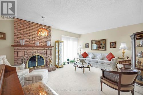 11 Glenview Crescent, London, ON - Indoor Photo Showing Living Room With Fireplace