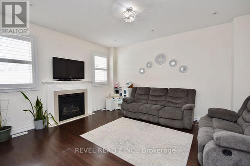 3108 Monarch Dr, Orillia, ON - Indoor Photo Showing Living Room With Fireplace