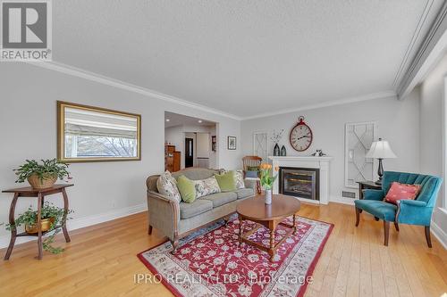 44 Rodcliff Road, New Tecumseth, ON - Indoor Photo Showing Living Room With Fireplace