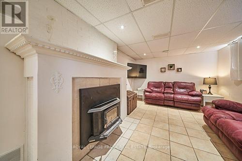2 Maxwell St, Kawartha Lakes, ON - Indoor Photo Showing Living Room With Fireplace