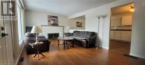 391 Levesque Street, Sturgeon Falls, ON - Indoor Photo Showing Living Room With Fireplace