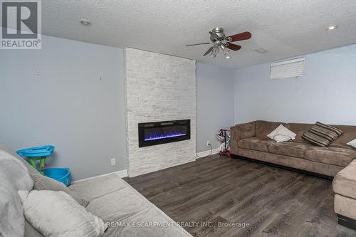 6 Tamarack Crt, Grimsby, ON - Indoor Photo Showing Living Room With Fireplace