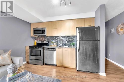 #1110 -38 Joe Shuster Way, Toronto, ON - Indoor Photo Showing Kitchen With Stainless Steel Kitchen