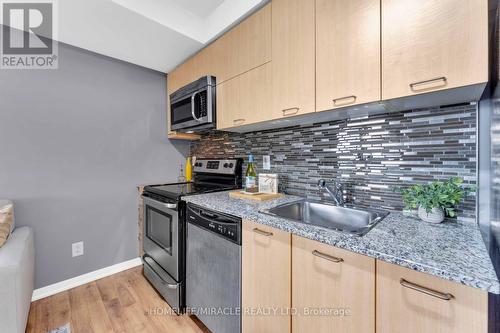 #1110 -38 Joe Shuster Way, Toronto, ON - Indoor Photo Showing Kitchen With Upgraded Kitchen